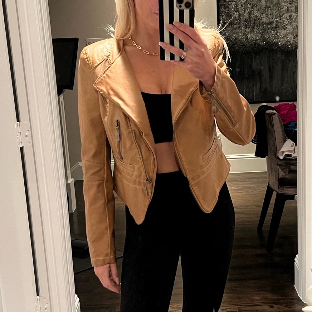 Unknown tan leather jacket. Got at an Italian leather store. Size small